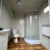 3-8-1-1.webp Contenedor Sanitario con Ducha y Cisterna